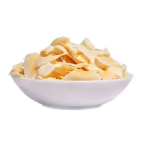 Flakes tal-ġewż inkaljat organiku